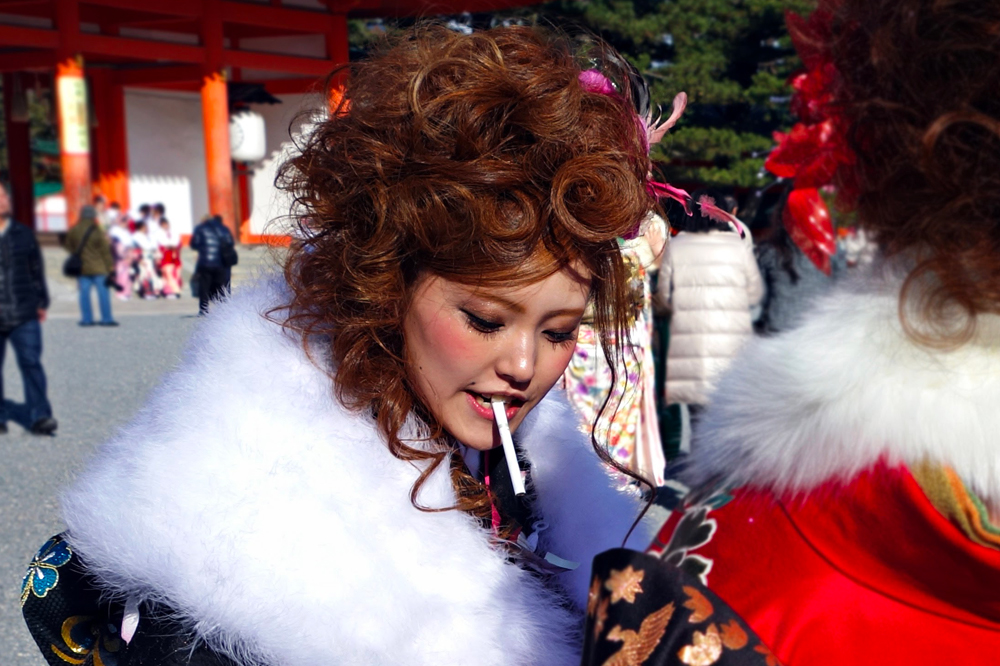 Woman smoking at parade