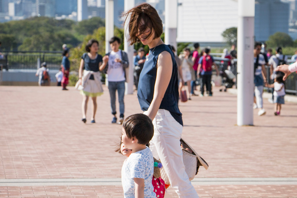 woman walking with child